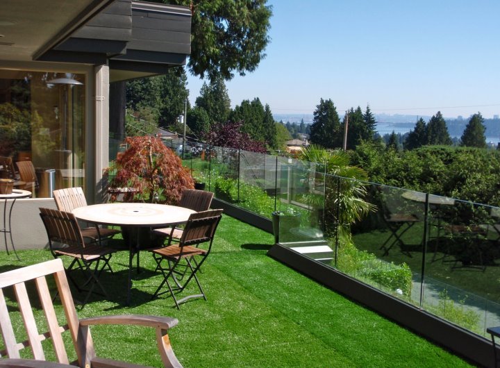 Decking can look like an extension of your yard with synthetic grass