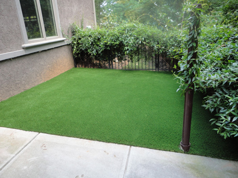 A Yard Looks Pristine After Getting A Synthetic Lawn